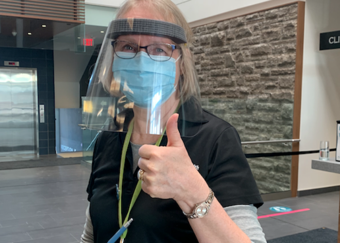 Public Health Nurse gives thumbs up