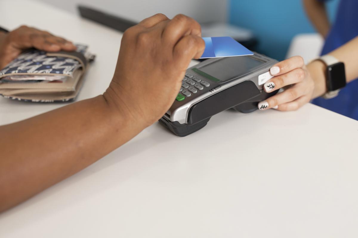 Debit machine and someone paying by card
