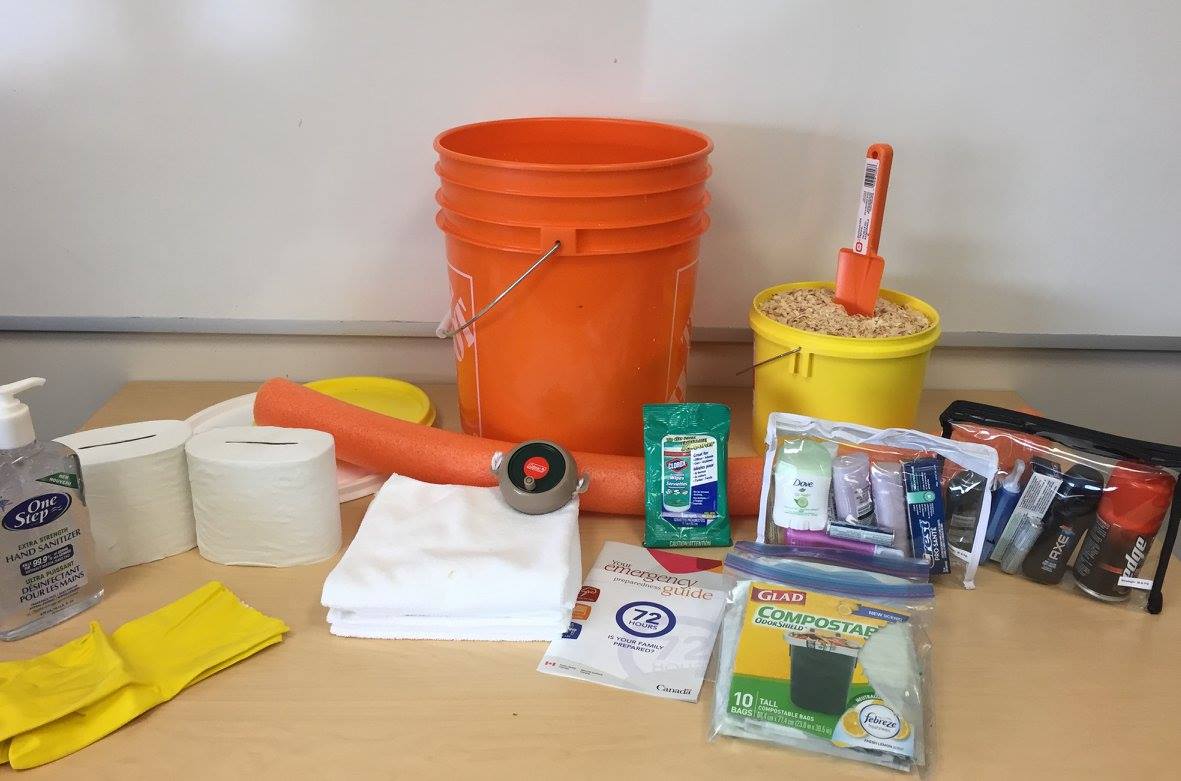 "Gotta go" kit shows a bucket, bucket with wood chips, pool noodle, garbage bags, toilet paper and wet wipes