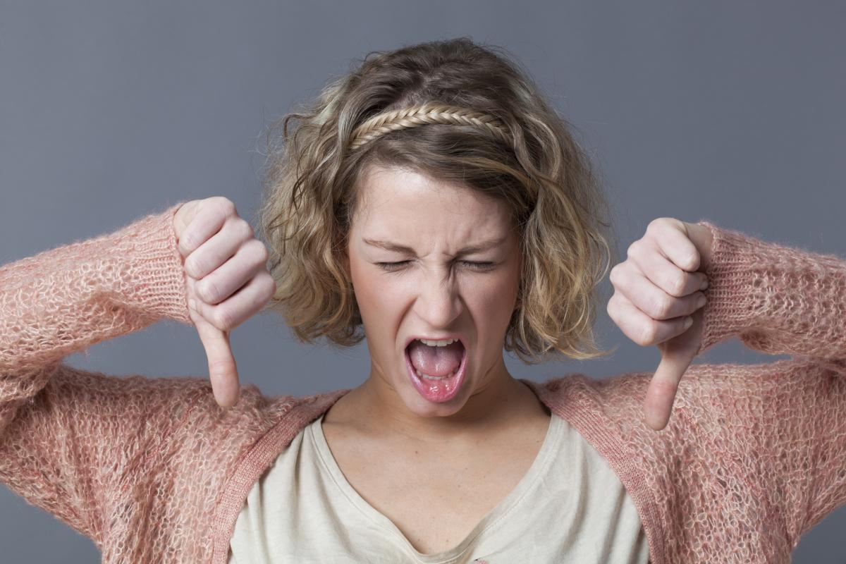 Woman thumbs down on feeling sick