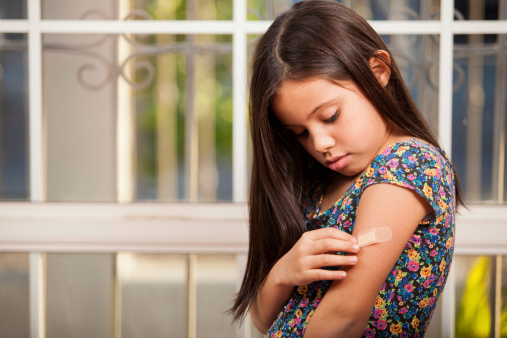 Girl with band-aid