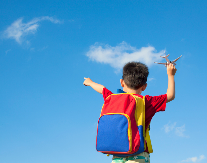 toddler wearing backpack