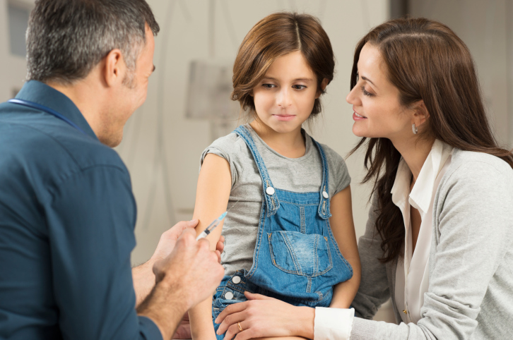 Doctor giving vaccination