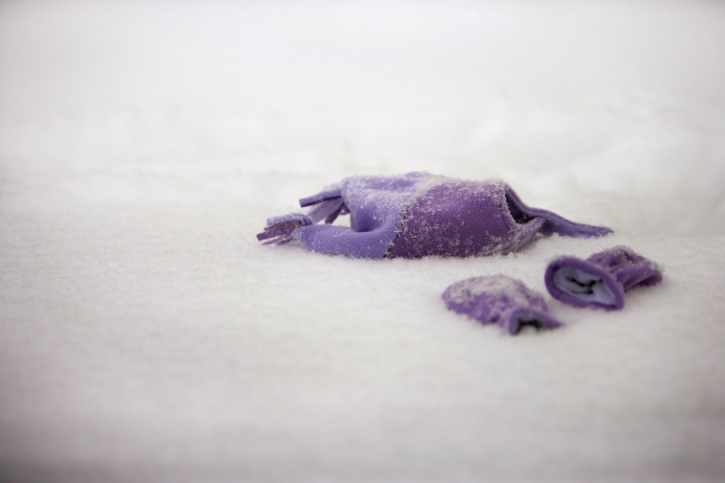 Winter clothes on the snowy ground