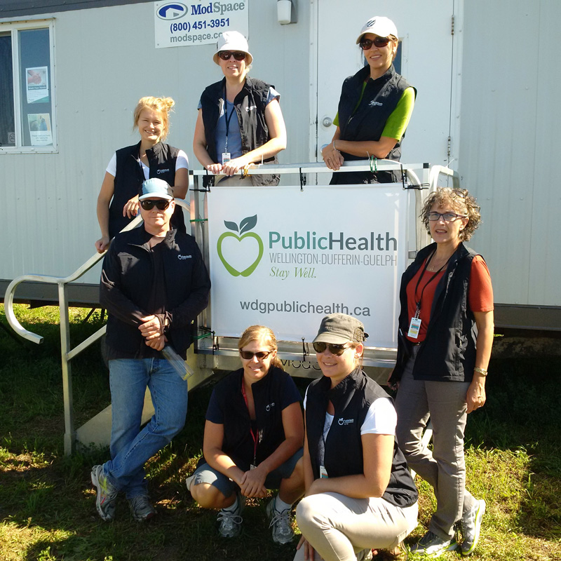 Inspectors in front of trailer