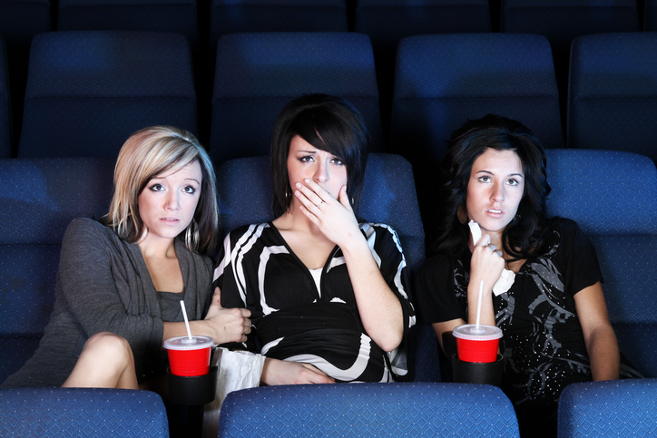 Teens watching a movie