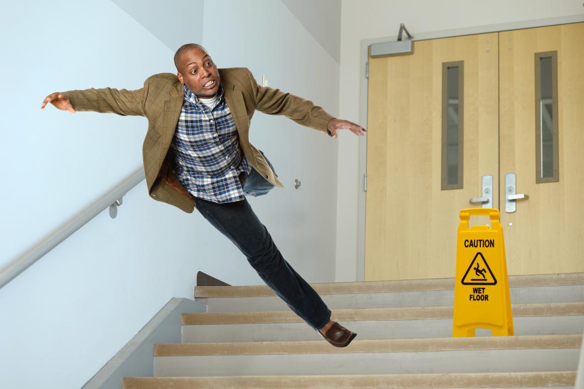 Man falling down stairs