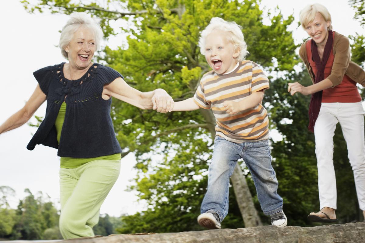 Grandmother, mother and boy toddler running