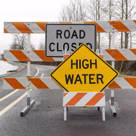road closed sign due to flooding 
