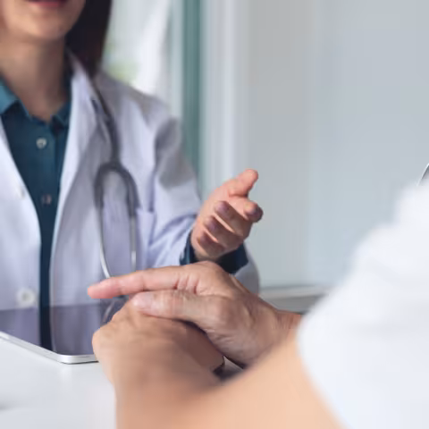 Doctor consulting with patient