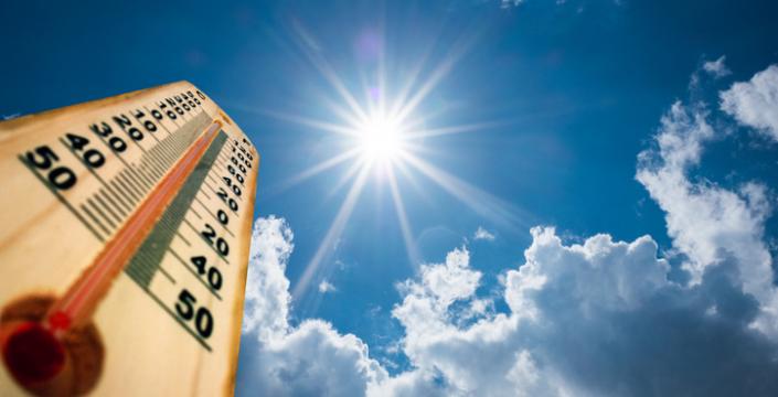 Thermometer pointing up towards the sun and sky