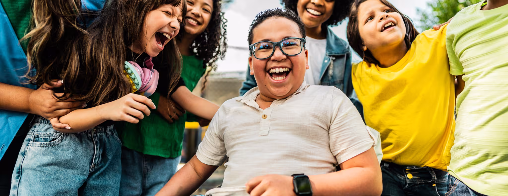 Happy students on schoolyard