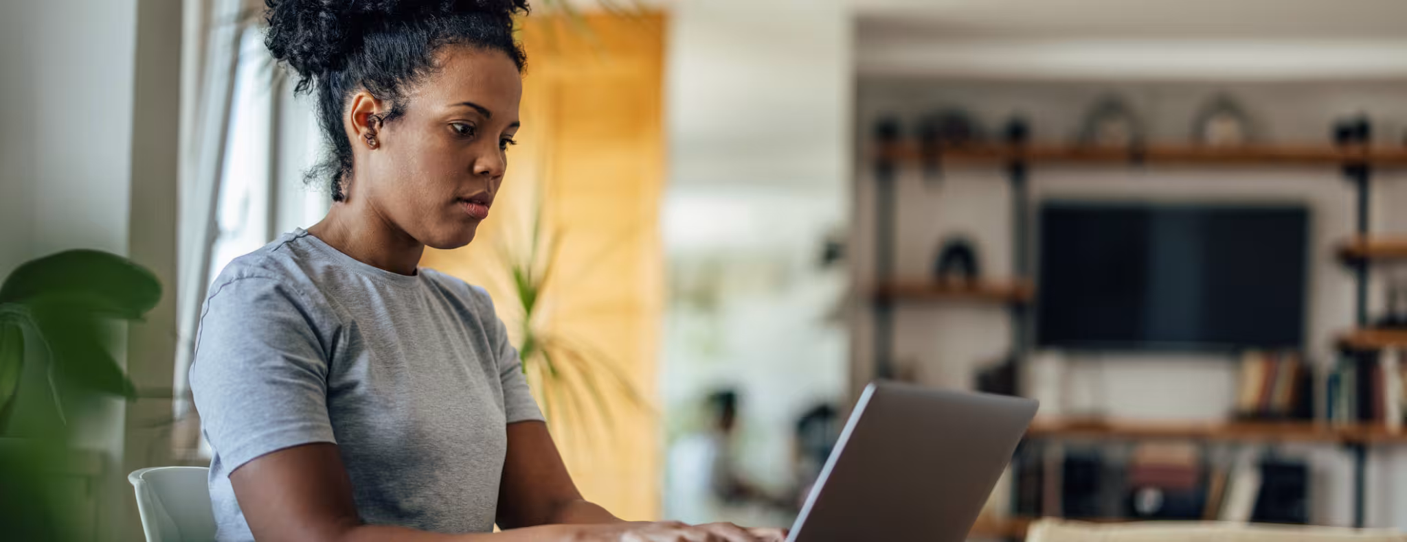 Thoughtful adult woman, browsing the internet