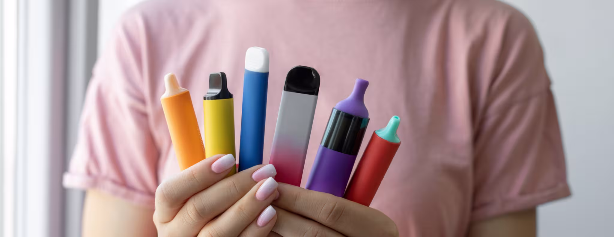 Vape cigarettes in woman hand