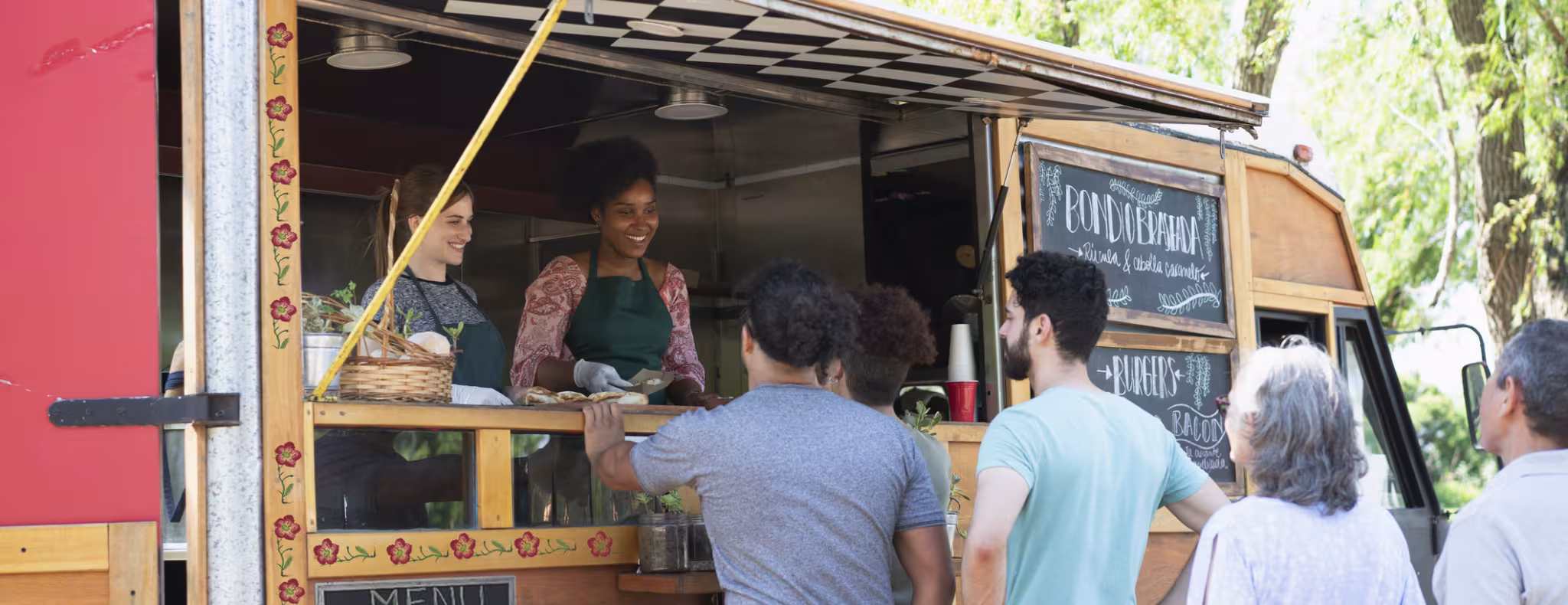 People making line to buy food from food truck