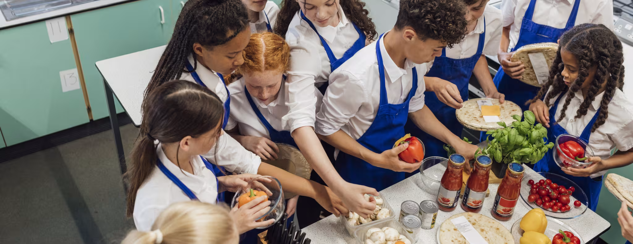 Kids cooking in a class