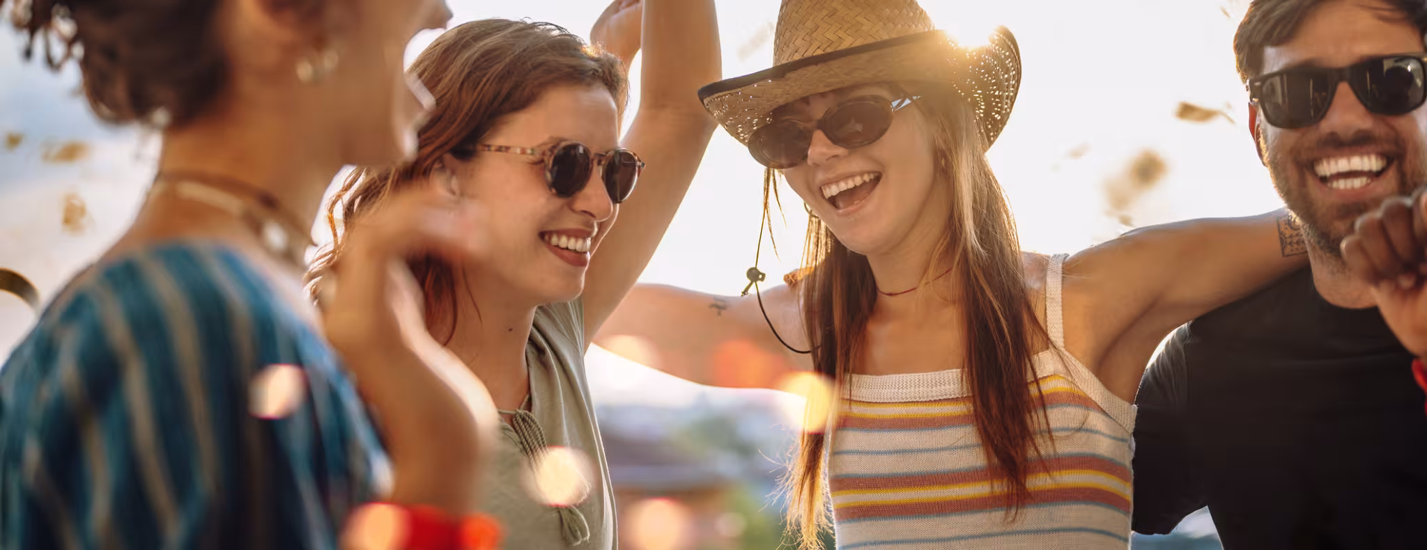 A young group of friends enjoying an outdoor gathering.