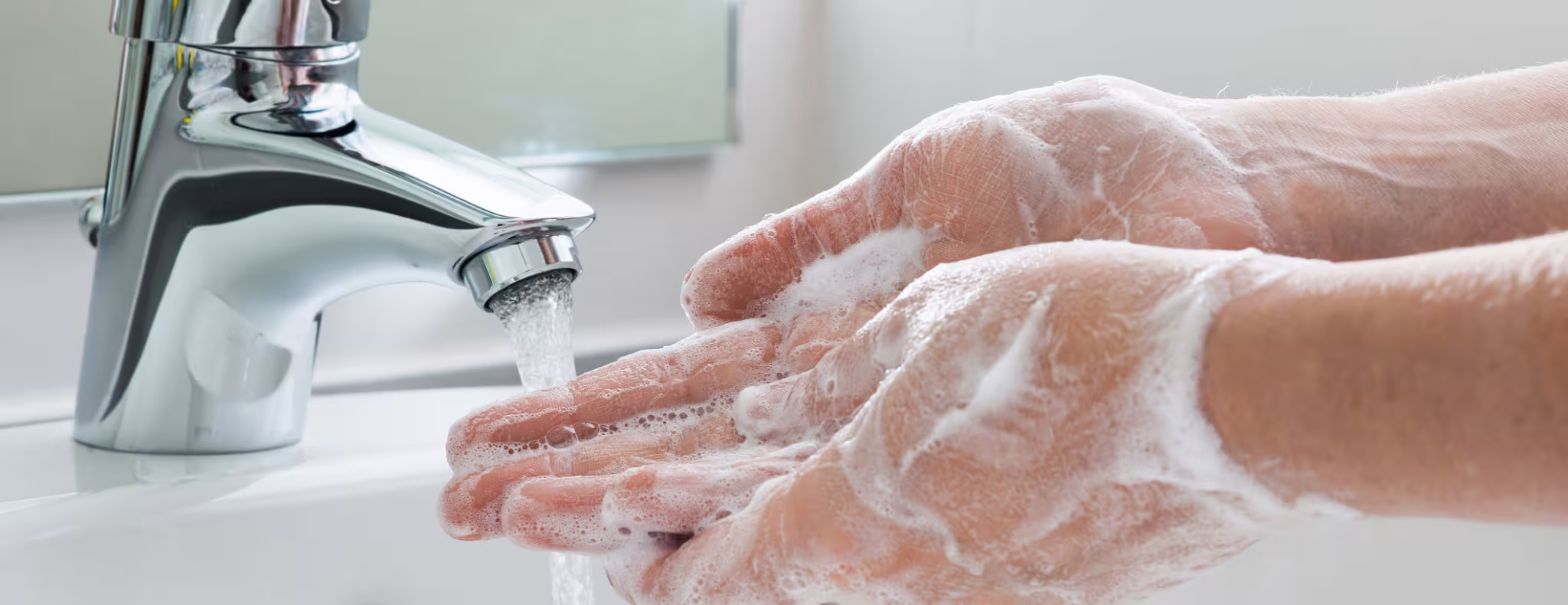 Handwashing in sink