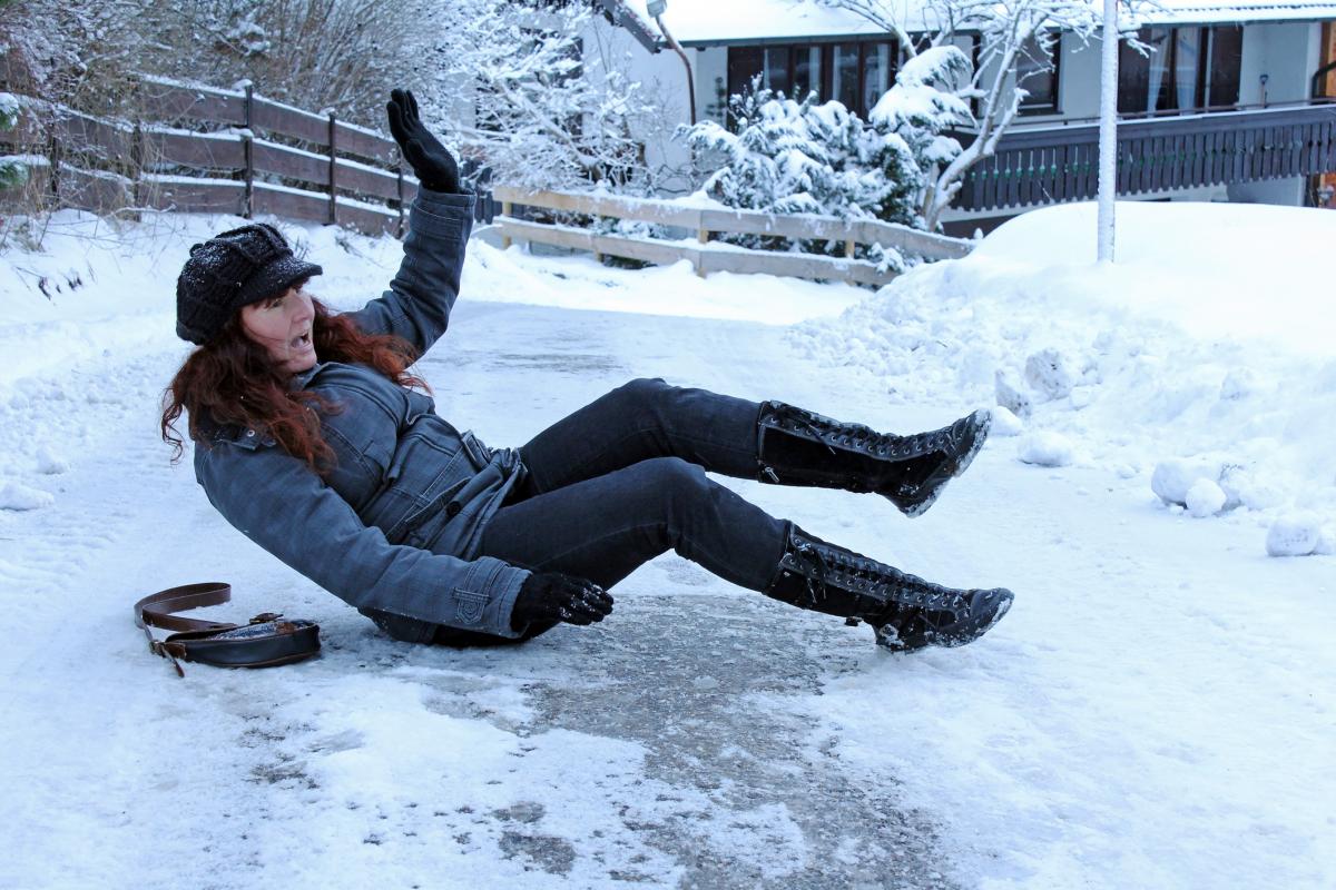 Woman falling on ice